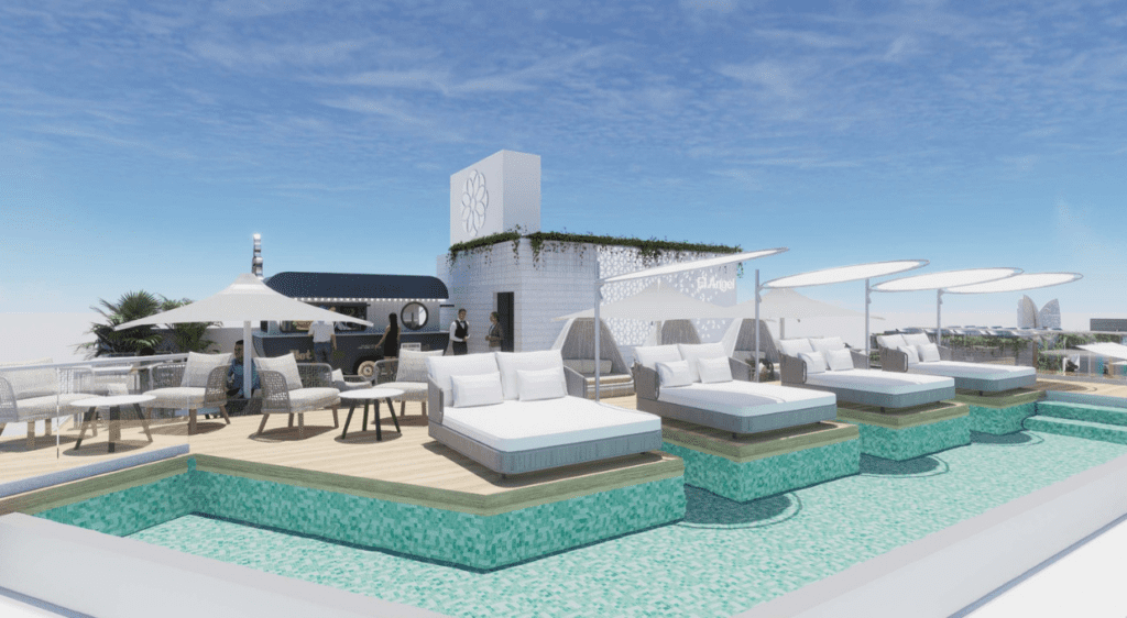 Rooftop relaxation area with private cabanas and a pool at Villa España Hotel in Benidorm.