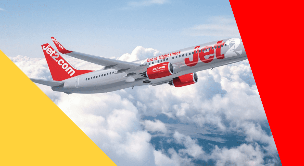 Jet2 airplane flying through the sky, promoting its flights with red and white branding on the aircraft.